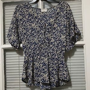 White and blue peplum blouse